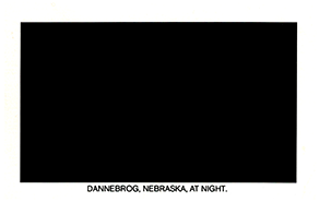 DANNEBROG, NEBRASKA, AT NIGHT.